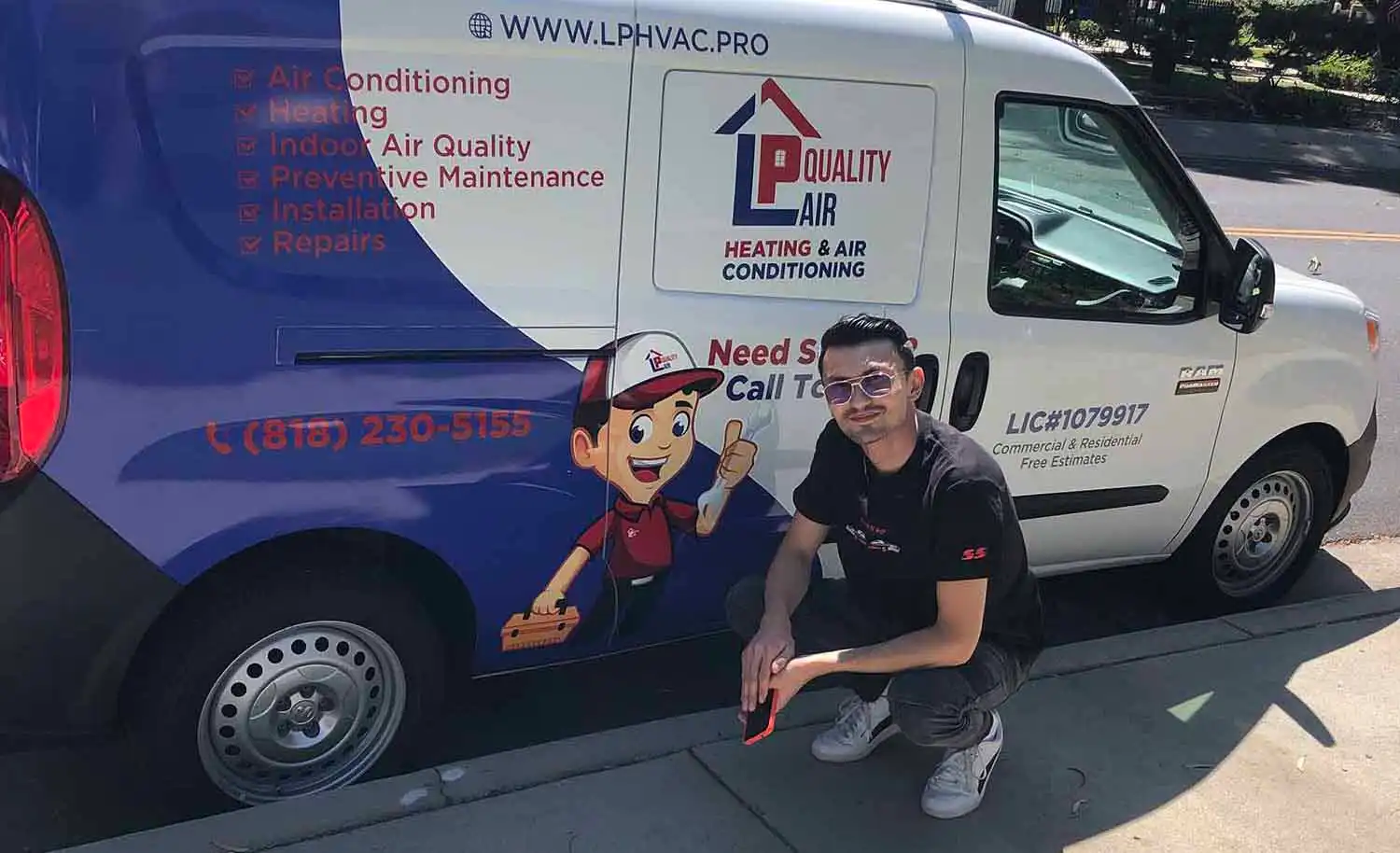 An HVAC technician installing new residential heating and cooling equipment.